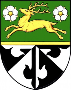 Znak obce Kožušany-Tážaly